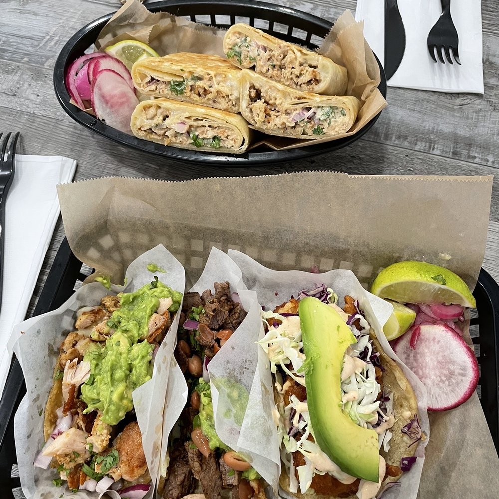 Bronze Bird signature dishes Grilled Sirloin BurgerFish TacosLobster Roll